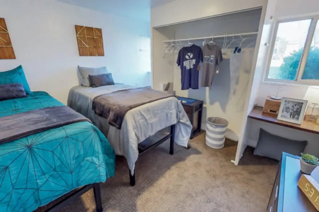 Two beds closet shelf and window bedroom at Stadium150 Apartments in Provo Student Accommodation