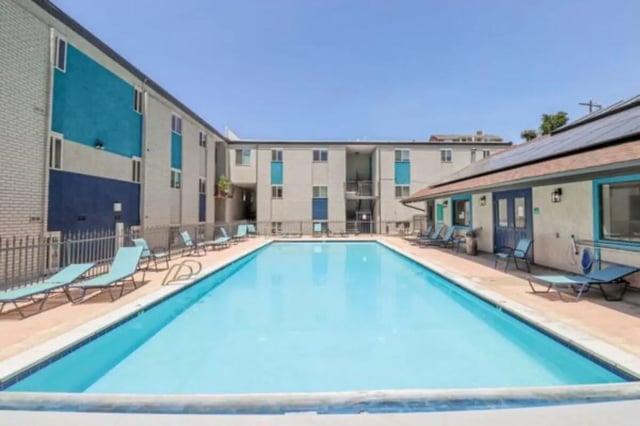 Pool with lounge chairs student housing exterior at Stadium150 Apartments in Provo Student Accommodation