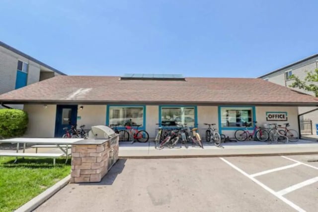Office building with bicycles and picnic table exterior at Stadium150 Apartments in Provo Student Accommodation