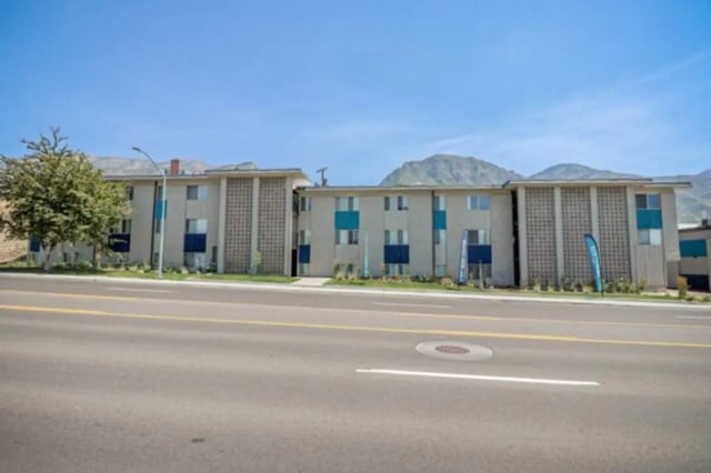 Apartment building with blue accents exterior at Stadium150 Apartments in Provo Student Accommodation