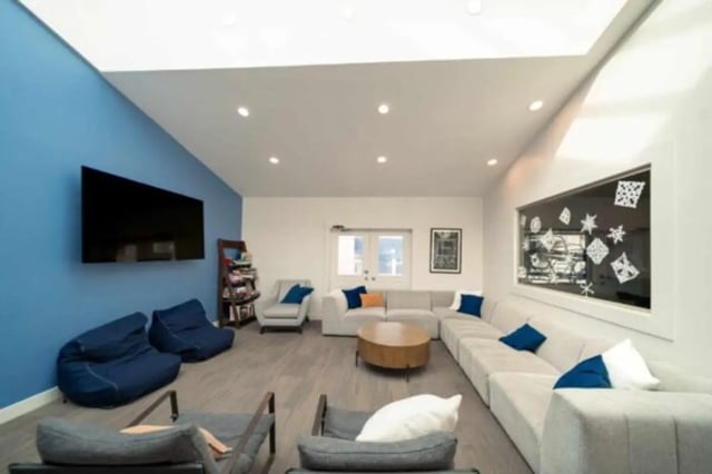 Modern lounge with sectional sofa beanbags and TV Living room at Stadium150 Apartments in Provo Student Accommodation