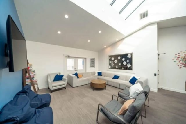 Lounge with sectional sofa television and beanbags Living room at Stadium150 Apartments in Provo Student Accommodation