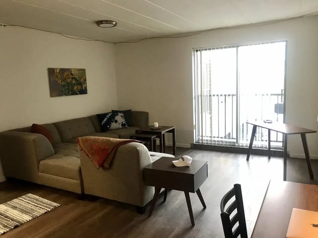 Sofa coffee tables and desk living room at Park Place Apartments in Provo Student Accommodation