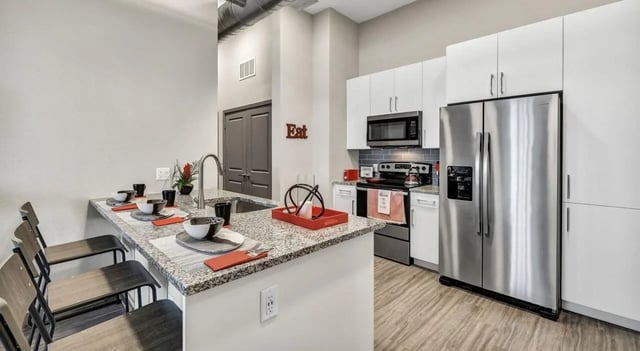 Island breakfast bar with seating kitchen at Haven At Elgin in Houston Student Accommodation