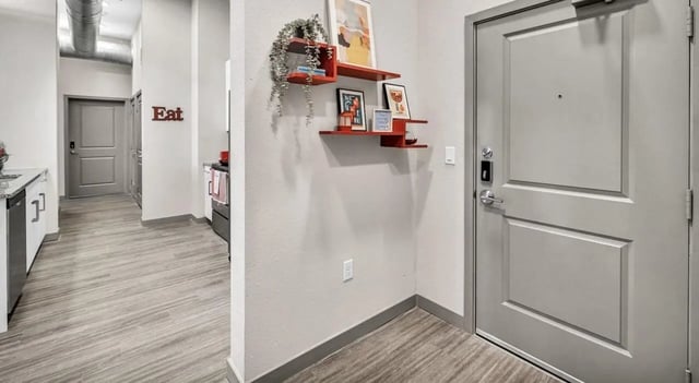 Hallway with kitchen and door interior at Haven At Elgin in Houston Student Accommodation