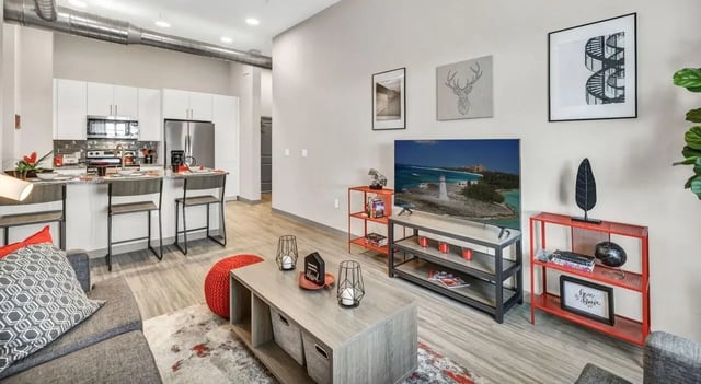 Modern living room with open kitchen and island living room kitchen at Haven At Elgin in Houston Student Accommodation