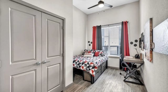 Bed desk and closet student bedroom at Haven At Elgin in Houston Student Accommodation