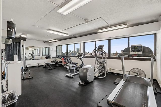 Treadmill elliptical recumbent bike gym fitness center at Chateau Student Housing Co-op in Minneapolis Student Accommodation