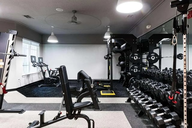 Dumbbells weight racks exercise bikes gym gym at 4050 Lofts in Tampa Student Accommodation
