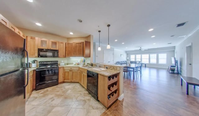 Modern kitchen with stainless steel appliances and dining area kitchen at Archstone Luxury Apartments in Gainesville Student Accommodation