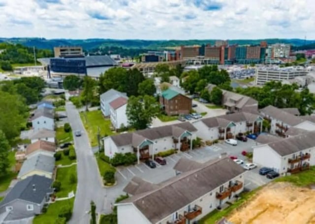 Apartment buildings with parked cars exterior at Ashley Oaks Apartments in Morgantown Student Accommodation