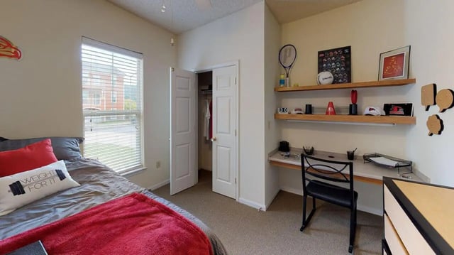 Bed desk shelves closet bedroom at Cape Trails in Cape Girardeau Student Accommodation