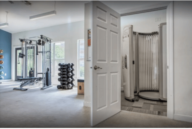 Gym equipment weights tanning bed fitness room at Cape Trails in Cape Girardeau Student Accommodation