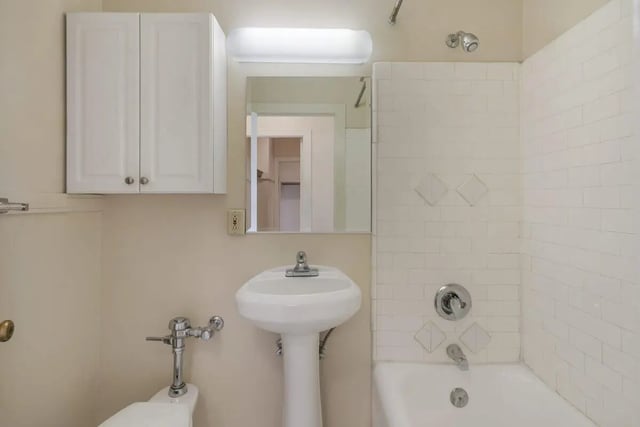 Toilet sink cabinets mirror shower bath bathroom at Commodore Duchess Apartments in Seattle Student Accommodation