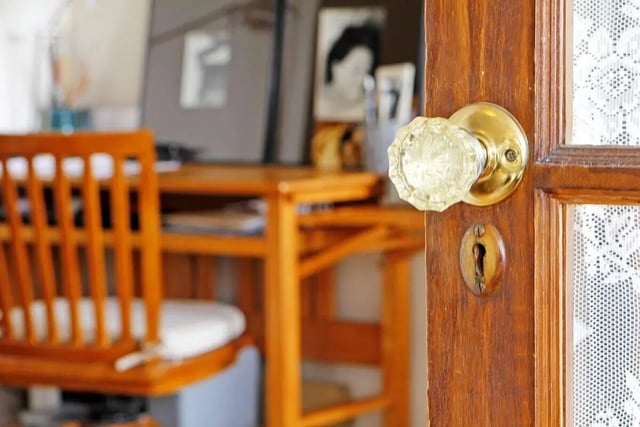 Wooden chair and desk with door study area at Commodore Duchess Apartments in Seattle Student Accommodation