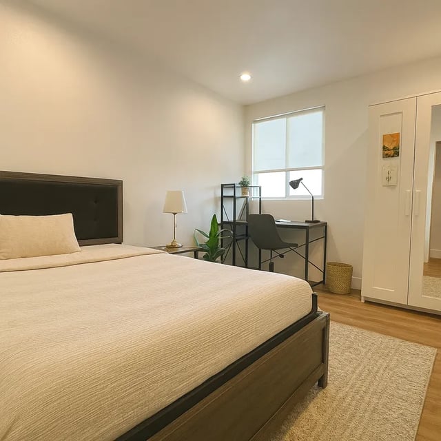 Bed desk shelving unit and closet bedroom at 1329 W 36th St in Los Angeles Student Accommodation
