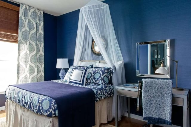 Canopy bed desk lamp mirror patterned bedding bedroom at The Vic in Greensboro Student Accommodation