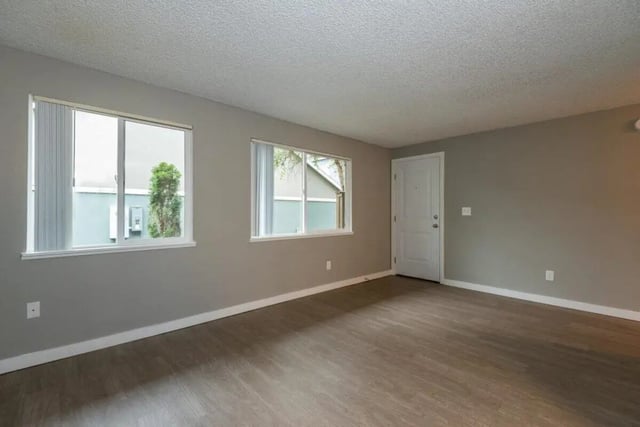 Empty room with two windows and a door Living room at Connery Place Apartments in Portland Student Accommodation