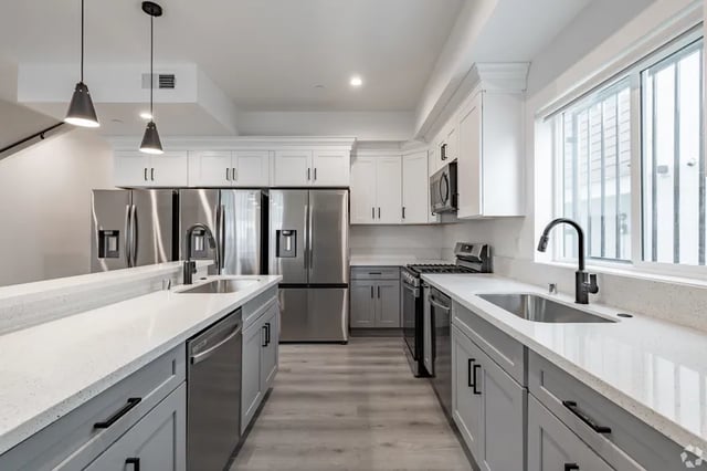 Modern kitchen with stainless steel appliances and granite countertops kitchen at 1360 W 35th St in Los Angeles Student Accommodation