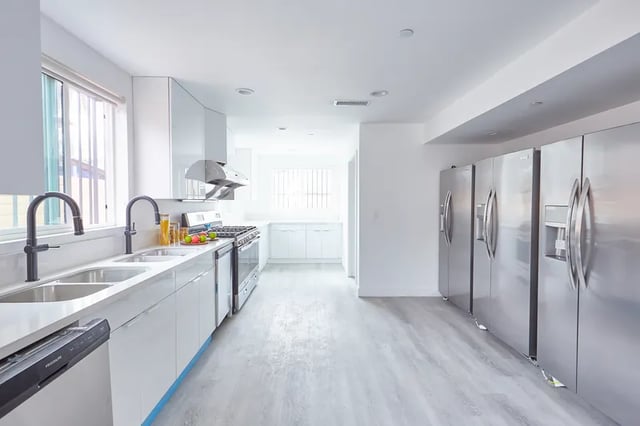 Modern kitchen with stainless steel appliances and sinks kitchen at 1360 W 35th St in Los Angeles Student Accommodation