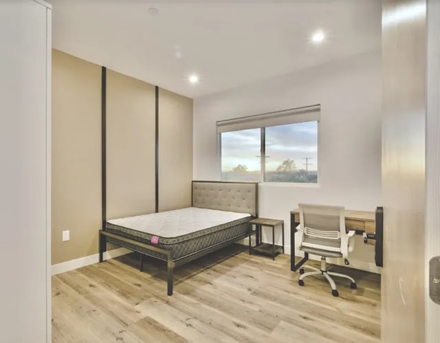 Bed desk chair and window bedroom at 1360 W 35th St in Los Angeles Student Accommodation