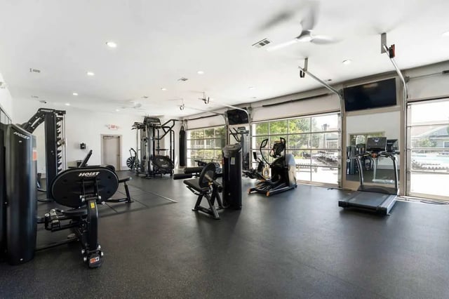 Gym equipment including treadmills and weight machines gym at West 22 in Kennesaw Student Accommodation