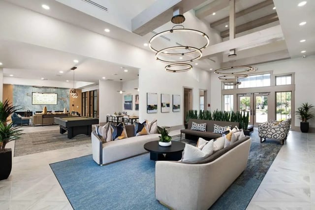 Sofas pool table and seating area lounge at West 22 in Kennesaw Student Accommodation