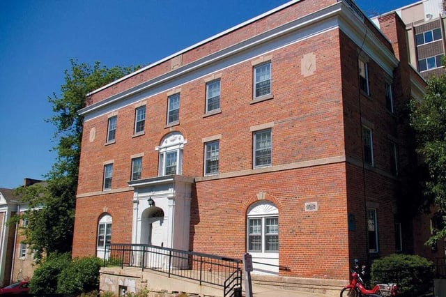 Red brick building with arched windows exterior at 613 Maggie Frances in Madison Student Accommodation