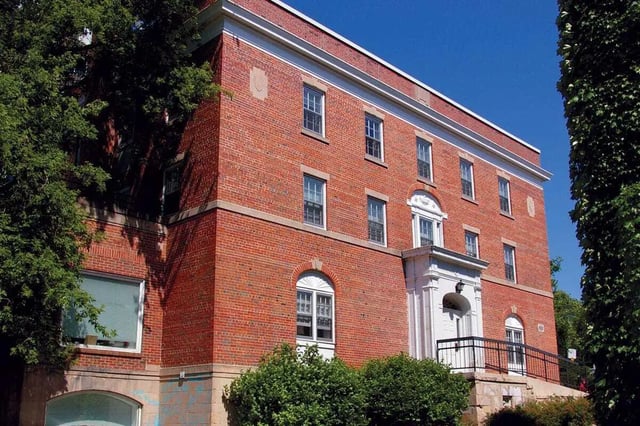 Red brick building with many windows exterior at 625 on Langdon in Madison Student Accommodation