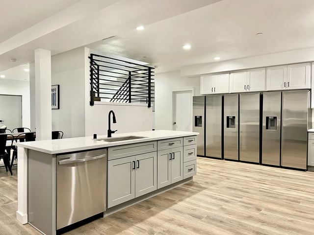 Modern kitchen with island and six refrigerators kitchen at 1587 W 35th St in Los Angeles Student Accommodation