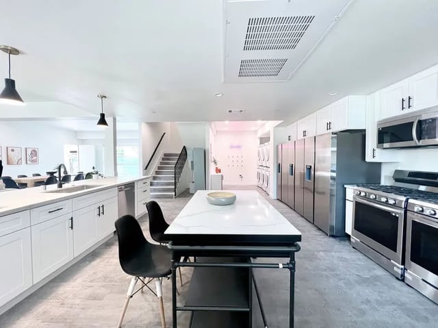 Kitchen island, appliances, laundry room, stairs kitchen at 1587 W 35th St in Los Angeles Student Accommodation