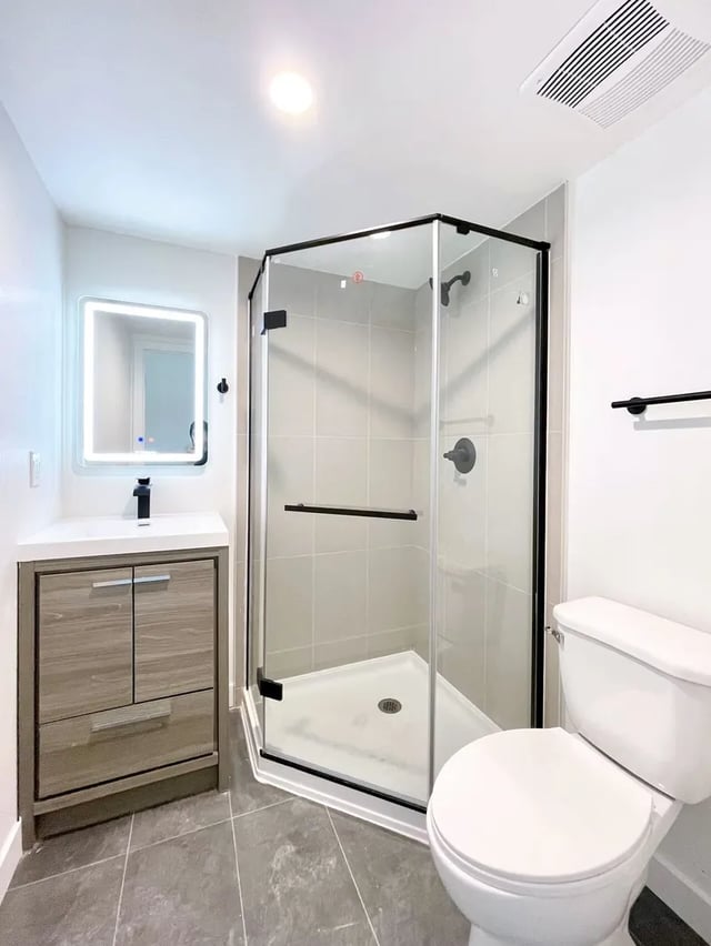 Vanity toilet shower stall and mirror Bathroom at 1587 W 35th St in Los Angeles Student Accommodation