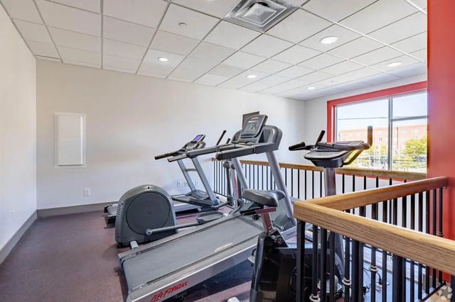 Treadmills elliptical bike and window Fitness Area at 65 West in Cincinnati Student Accommodation