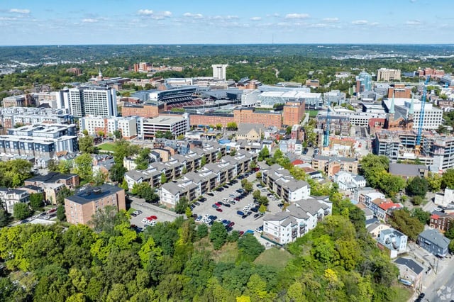 Apartment buildings with many parked cars exterior at 65 West in Cincinnati Student Accommodation