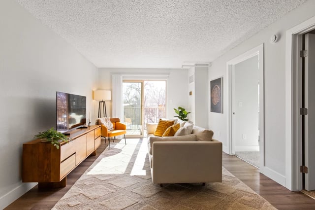 Sofa chair tv console geometric rug living room at Mountainaire Boulder in Boulder Student Accommodation
