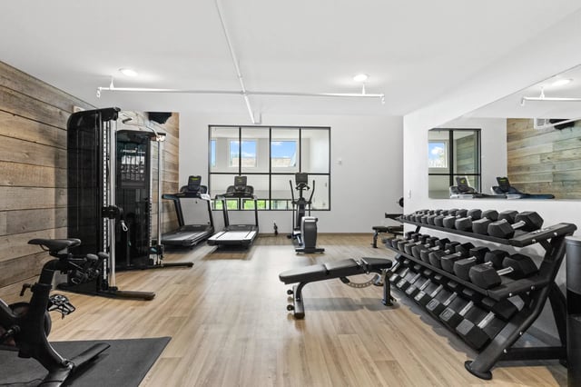 Gym with treadmills elliptical and weights gym at Mountainaire Boulder in Boulder Student Accommodation