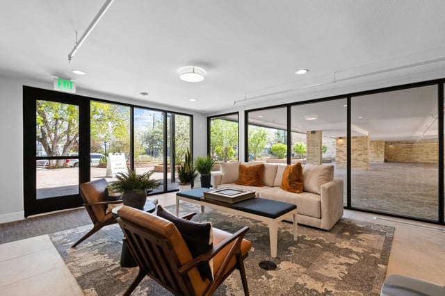 Sofa chairs coffee table living room area at Mountainaire Boulder in Boulder Student Accommodation