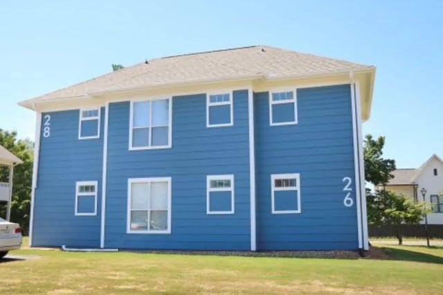 Blue duplex building with multiple windows exterior at Clemson Village in Clemson Student Accommodation