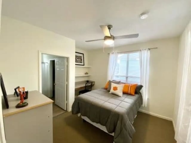 Bed with pillows desk and dresser bedroom at Clemson Village in Clemson Student Accommodation