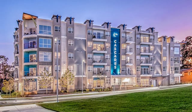 Modern apartment building with balconies exterior at Cascades Luxury Apartments in Gainesville Student Accommodation