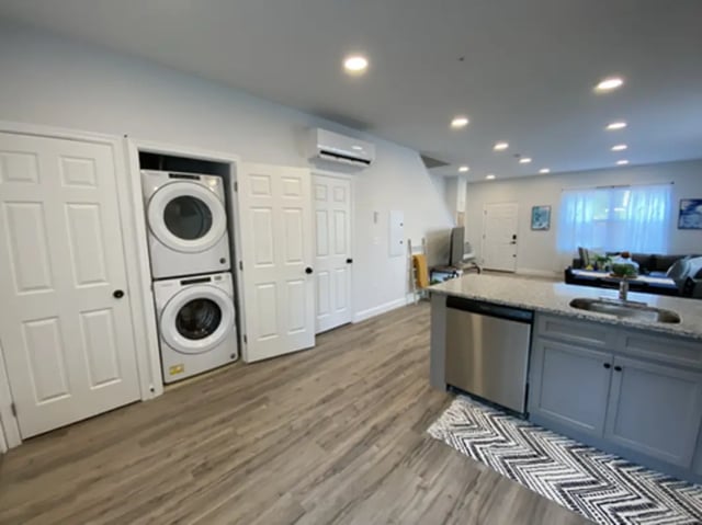 Washer dryer beside doors then living kitchen area at The Rail Yard in Newark Student Accommodation