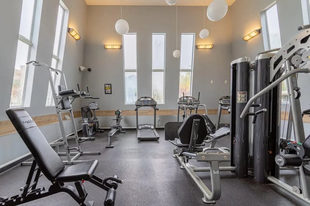 Gym equipment including treadmills and weight machines playing area at Hawks Landing in Oxford Student Accommodation