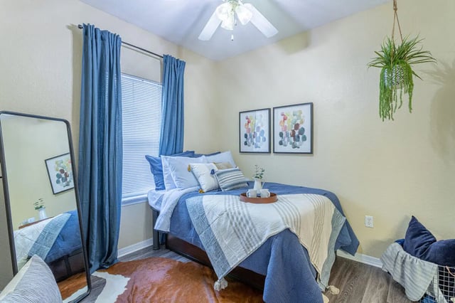 Bed mirror art prints and rug bedroom at Hawks Landing in Oxford Student Accommodation