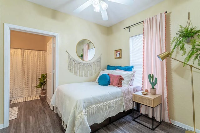 Bed with macrame mirror and plant bedroom at Hawks Landing in Oxford Student Accommodation