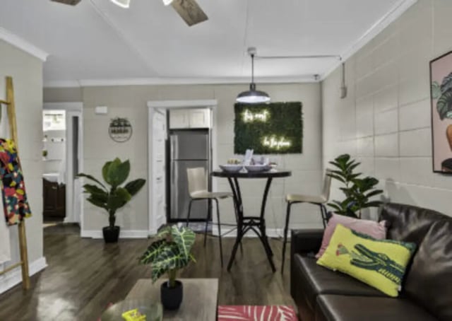 Sofa dining table plants kitchen exterior living room at 759 Basin LLC in Tallahassee Student Accommodation