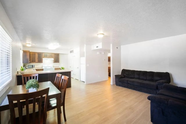 Kitchen dining area and living room. at 7th & University Apartments in St. George Student Accommodation