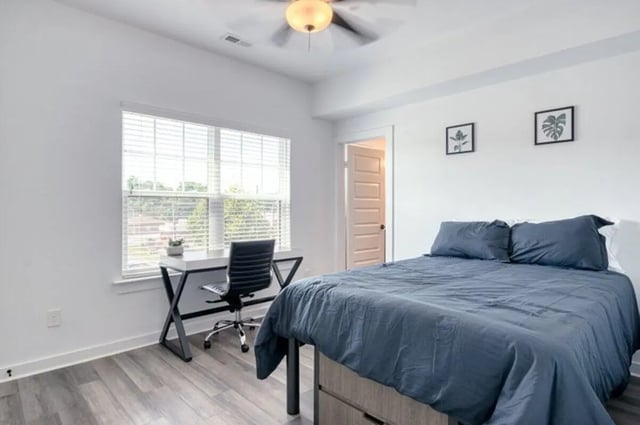 Bed desk chair and window Bedroom at Haven Blacksburg in Blacksburg Student Accommodation