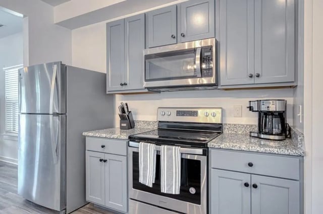 Refrigerator microwave oven stove coffee maker kitchen at Haven Blacksburg in Blacksburg Student Accommodation