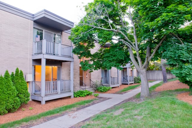 Balconies and pathway exterior of building at East Knolls Apartment in East Lansing Student Accommodation