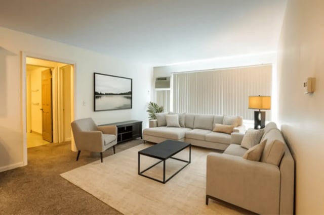 Sofa chairs coffee table media stand artwork Living room at Americana Apartments in East Lansing Student Accommodation